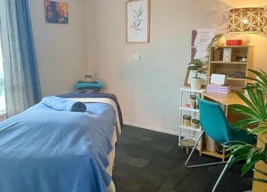 Tranquil massage room at Body and Soul Holistic Wellbeing, Mokau, Waikato, NZ with a cozy, inviting ambiance.
