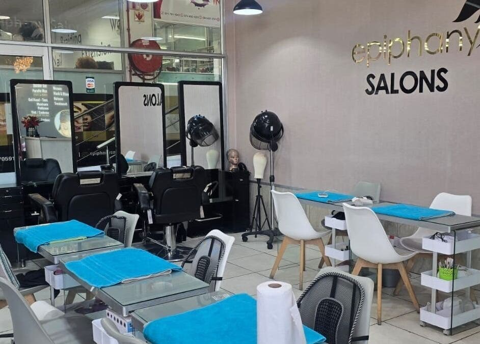 Epiphany Salons SA in Randburg, Gauteng, ZA boasts a chic interior with styling stations and modern decor.