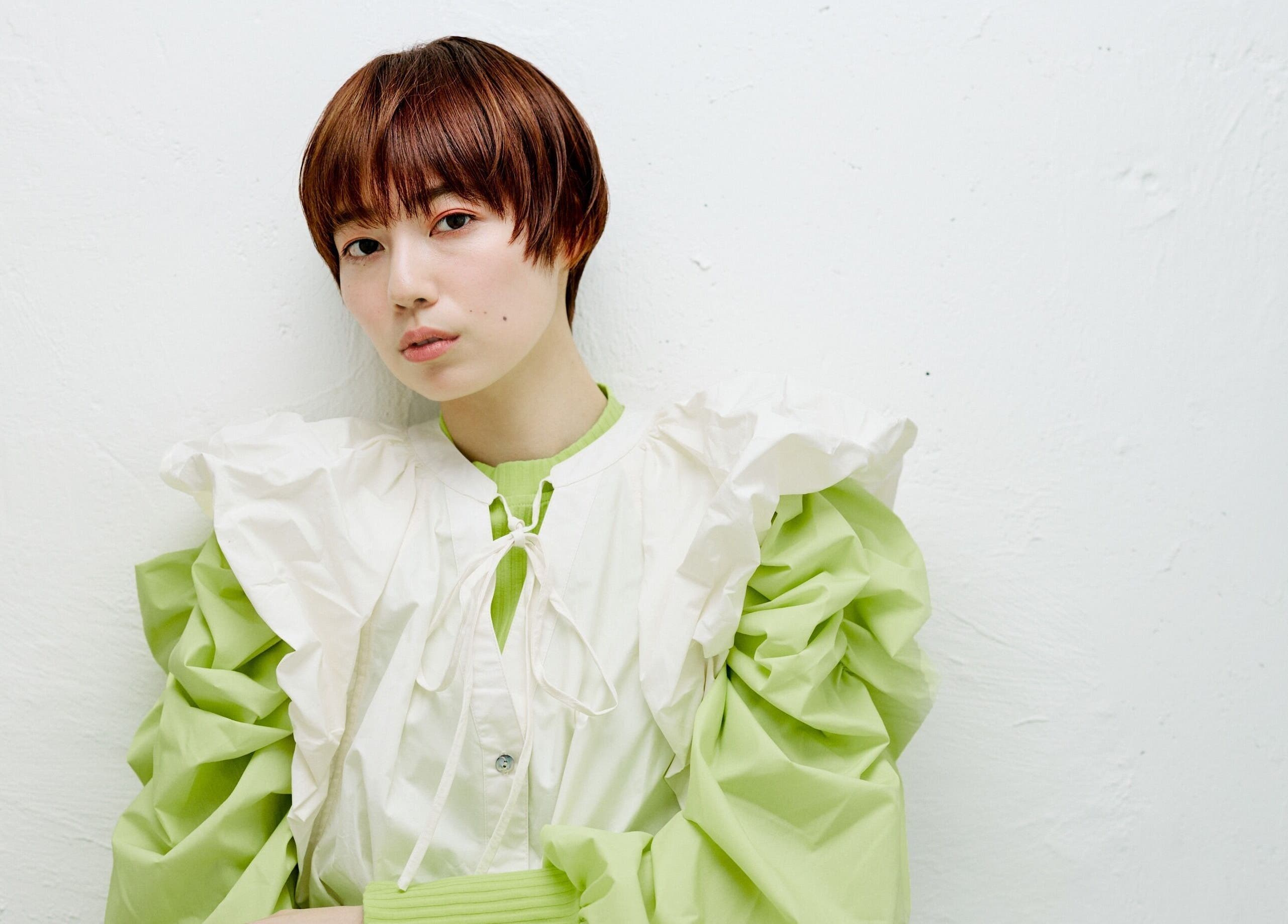 Person in stylish white and green attire at AL etro, กรุงเทพมหานคร, กรุงเทพมหานคร, TH.