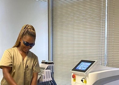 Specialist performing laser treatment at Mystique Aesthetics Century City, Cape Town, Western Cape, ZA.