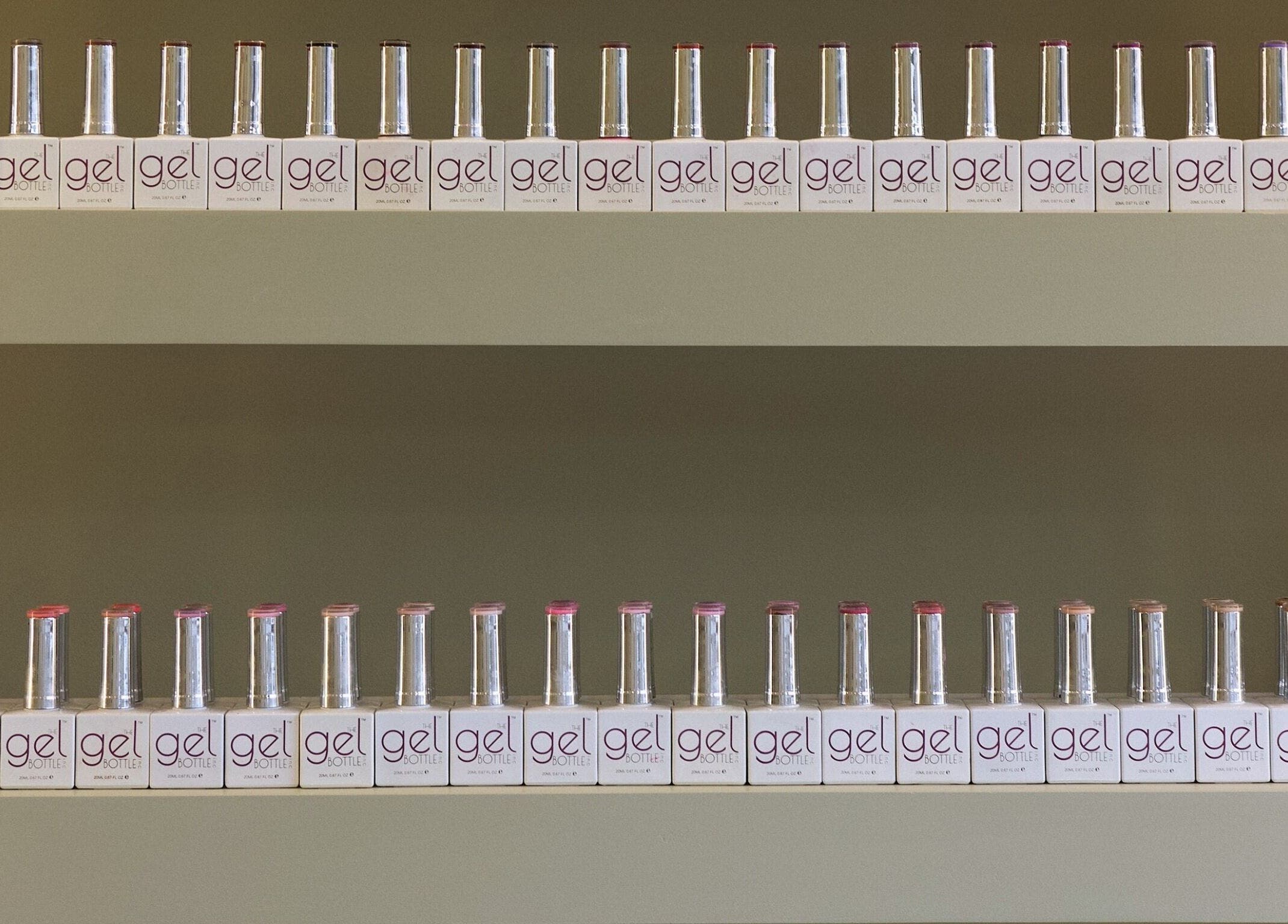 Rows of gel nail polish bottles at The NailpodTw in Royal Tunbridge Wells, England, GB.