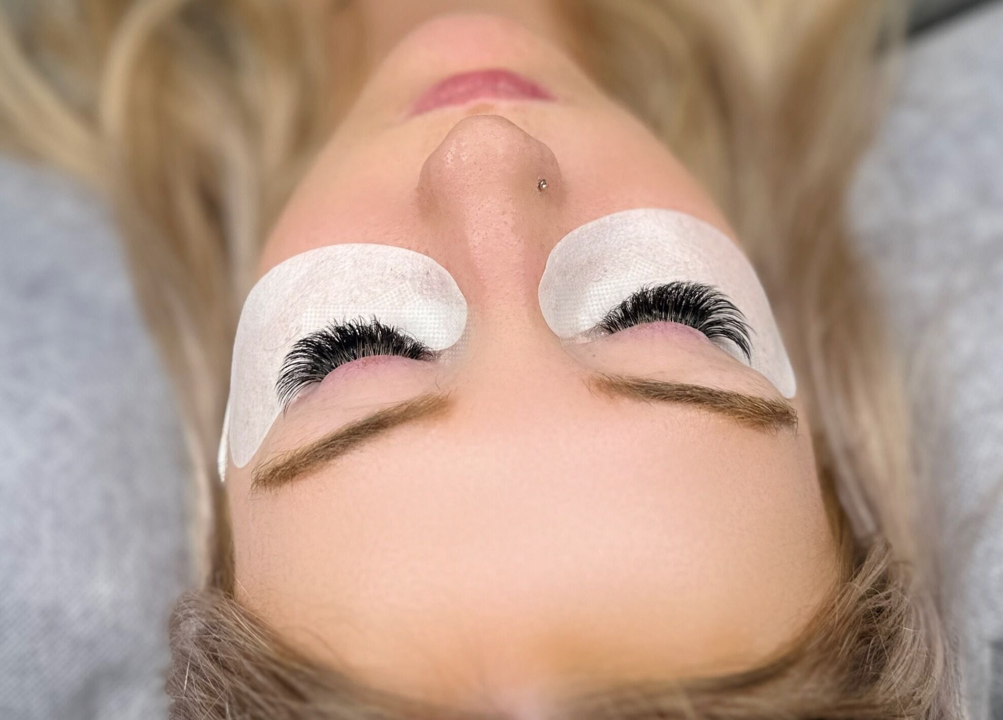 Close-up of lash extension application at Hoho Lashes in Glenelg East, South Australia, AU.