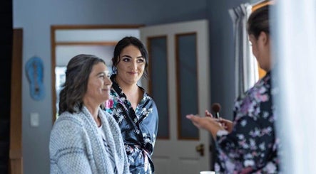 Women enjoy makeup session at Alexandra Fabish Makeup Artistry, Christchurch, Canterbury Region, NZ.