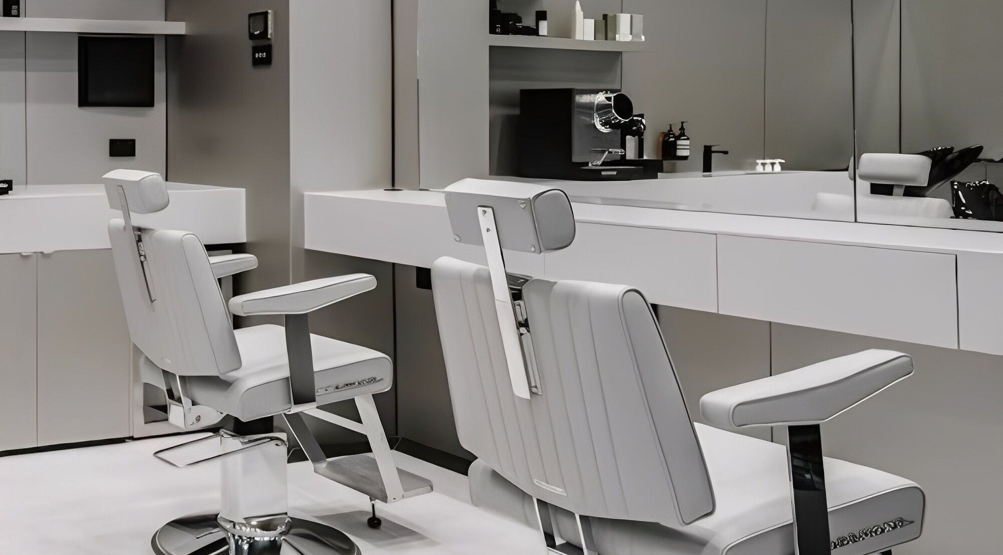 Luxurious white salon chairs in BY FRANCE, Sydney, New South Wales, AU, offering premium beauty services.