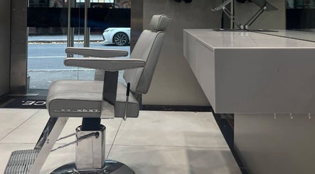Modern salon chair at BY FRANCE in Sydney, New South Wales, AU, showcasing sleek design and comfort.