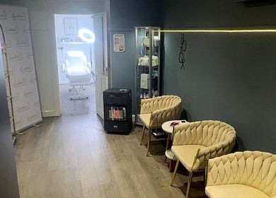 Cozy waiting area at Laesthetics Beauty & More, Catrine, Scotland, GB with elegant seating and ambient lighting.