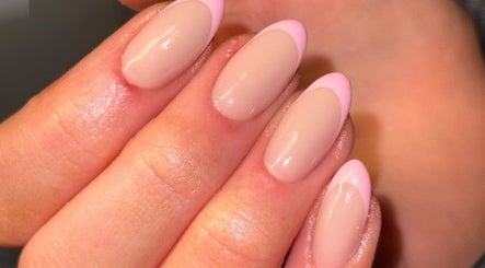Close-up of elegant pink manicured nails at The Beauty Room, Seaford, England, GB.