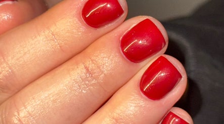 Glamorous red manicure at The Beauty Room, Seaford, England, GB, showcasing perfect nail artistry.