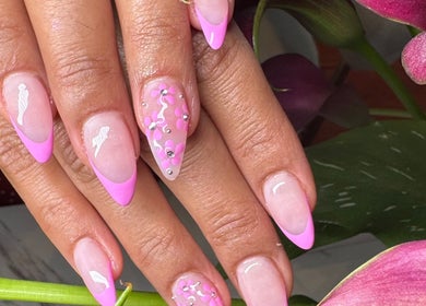 Elegant pink nail art with floral and gem details at JJ Nails Spa by Helen Nham, Whitby, Ontario, CA.