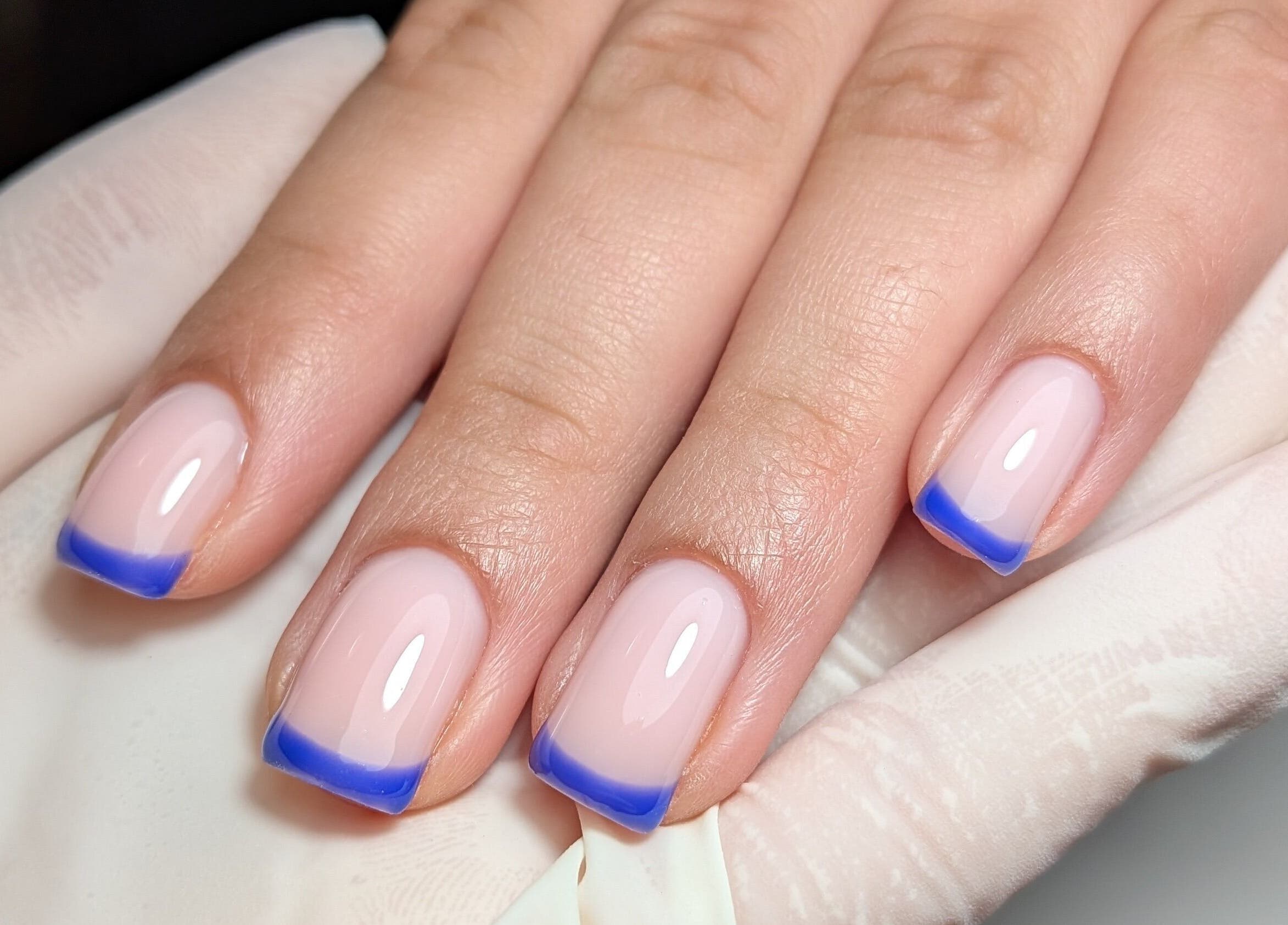 Blue French tips manicure at Manicured by Candela - Russian Manicure & Builder Gel, Smithfield, NSW, AU.