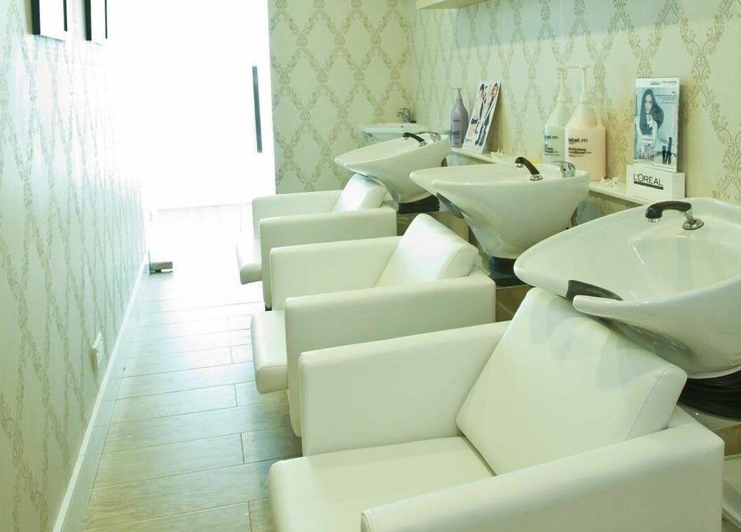 Chic salon wash station at Blodry Bar Ladies Salon, Dubai, AE, offering luxury hair care services.