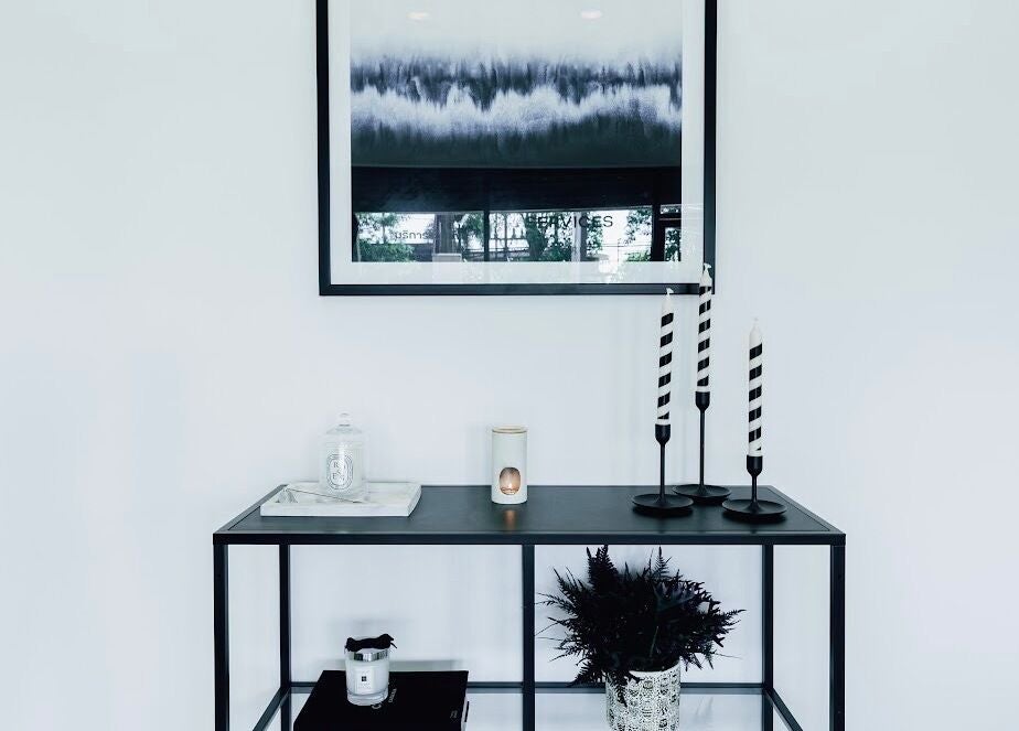 Elegant decor at Velvet Waxing, Phuket, Phuket, TH showcasing a minimalist table and modern art.