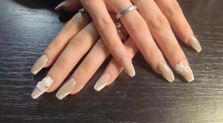 Elegant nail art with floral design at Be*Spelled Nails in Monte Vista, Colorado, US.
