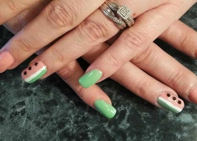 Colorful watermelon nail art showcased at Be*Spelled Nails, Monte Vista, Colorado, US.