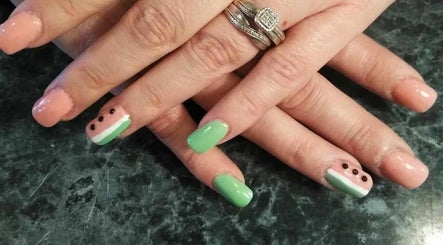Colorful watermelon nail art showcased at Be*Spelled Nails, Monte Vista, Colorado, US.