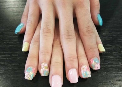 Colorful floral nail designs at Be*Spelled Nails, Monte Vista, Colorado, US.