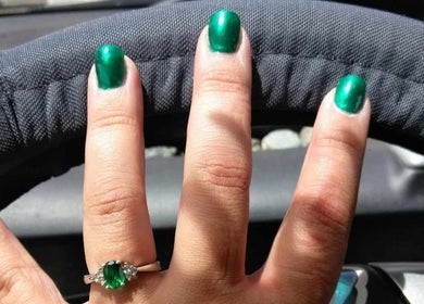 Stylish green manicure at Be*Spelled Nails, Monte Vista, Colorado, US, enhancing nail beauty.