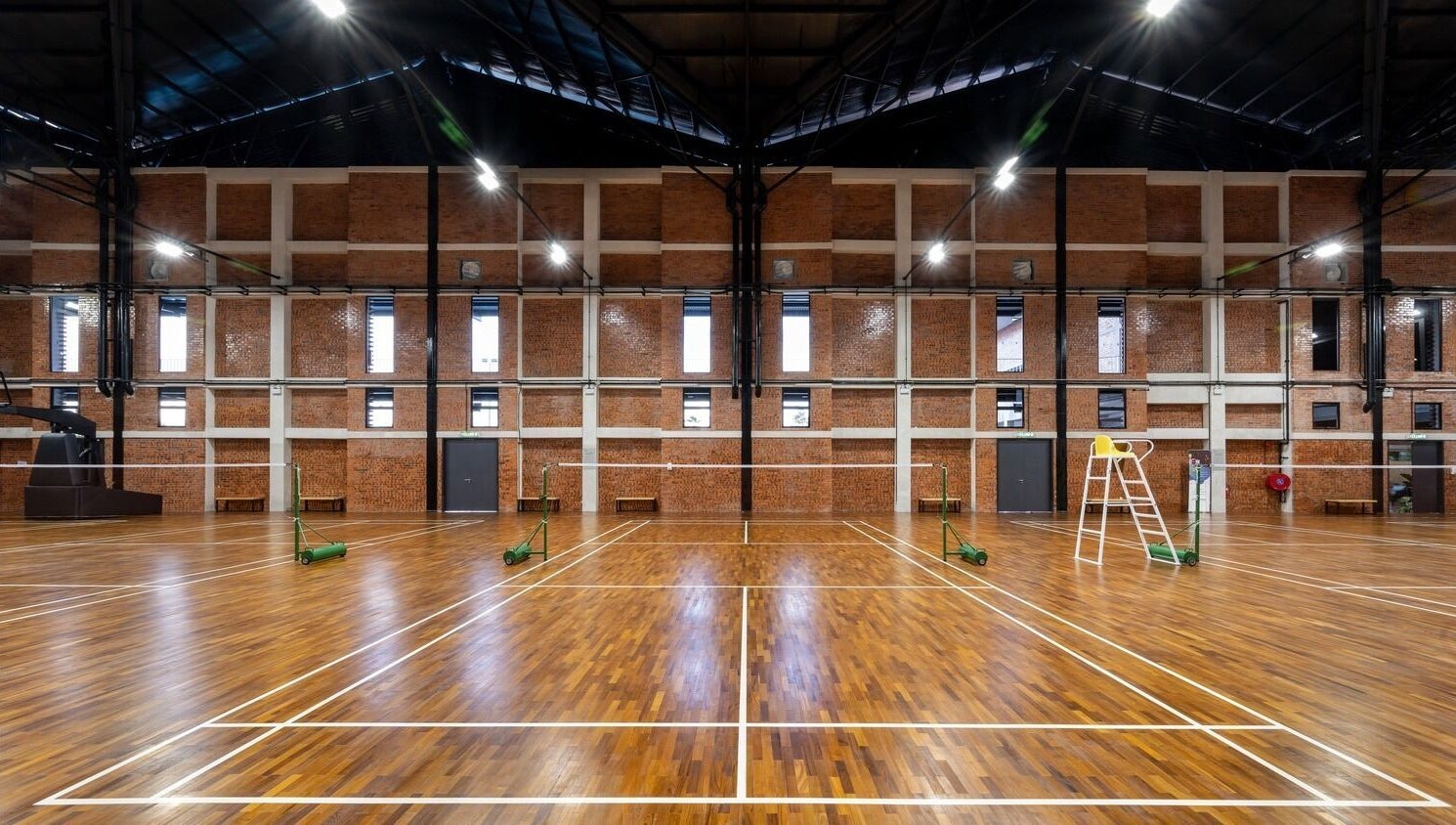 Wide view of Estuari Sports Complex indoor court in Iskandar Puteri, Johor, MY, showcasing spacious athletic facilities.