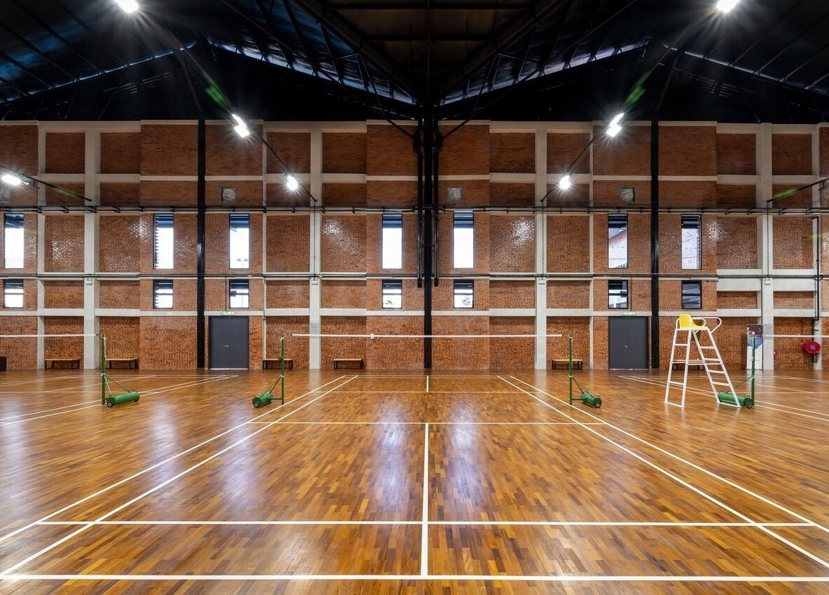 Wide view of Estuari Sports Complex indoor court in Iskandar Puteri, Johor, MY, showcasing spacious athletic facilities.