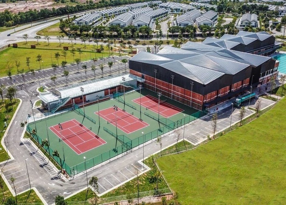 Aerial view of Estuari Sports Complex in Iskandar Puteri, Johor, MY showcasing tennis courts and modern facilities.