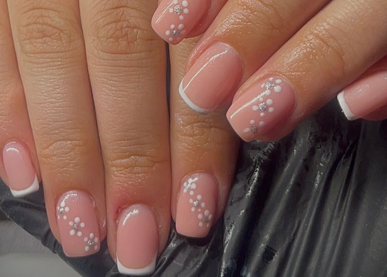 Elegant floral nail art at Beauty By Neve in Dalton-in-Furness, England. Perfect for stylish manicures.