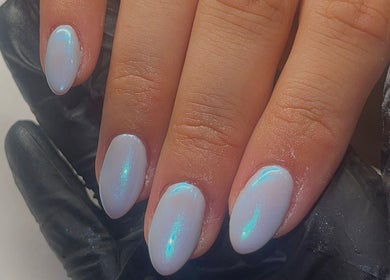 Elegant iridescent manicure at Beauty By Neve, Dalton-in-Furness, England, GB, showcasing delicate shimmer.