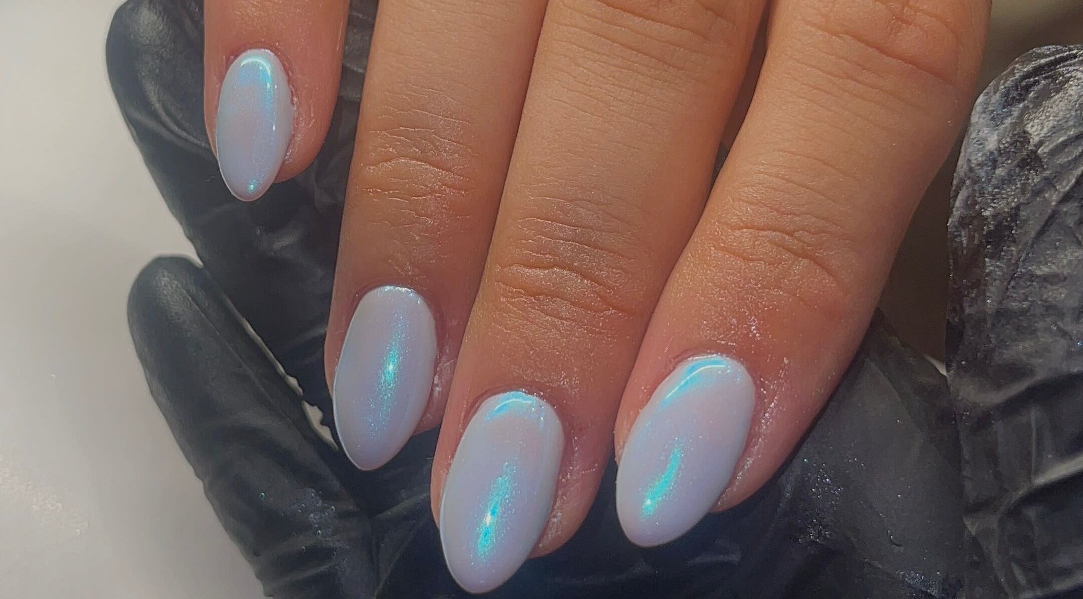 Elegant iridescent manicure at Beauty By Neve, Dalton-in-Furness, England, GB, showcasing delicate shimmer.