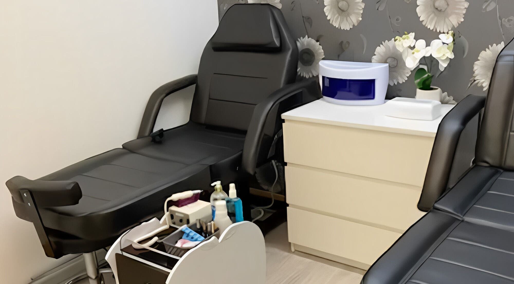 Luxurious treatment chair in Why Not salon, Loughborough, England, GB, with modern equipment and soothing decor.