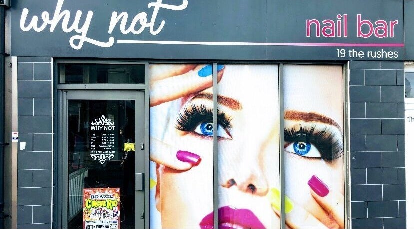 Front view of Why Not nail bar in Loughborough, England, GB featuring a colorful beauty mural.