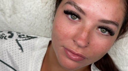 Elegant eyelash extensions at Lashed Up in Swindon, England, GB, highlighting lush lashes and flawless complexion.
