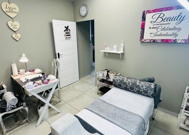 Therapy room at INDIVIDUELLE SKIN & BODY, Durban, Kwazulu-natal, ZA with cozy decor and skincare essentials.