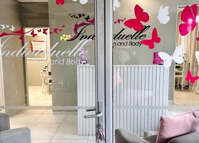 Glass door with butterfly design at INDIVIDUELLE SKIN & BODY, Durban, Kwazulu-natal, ZA.