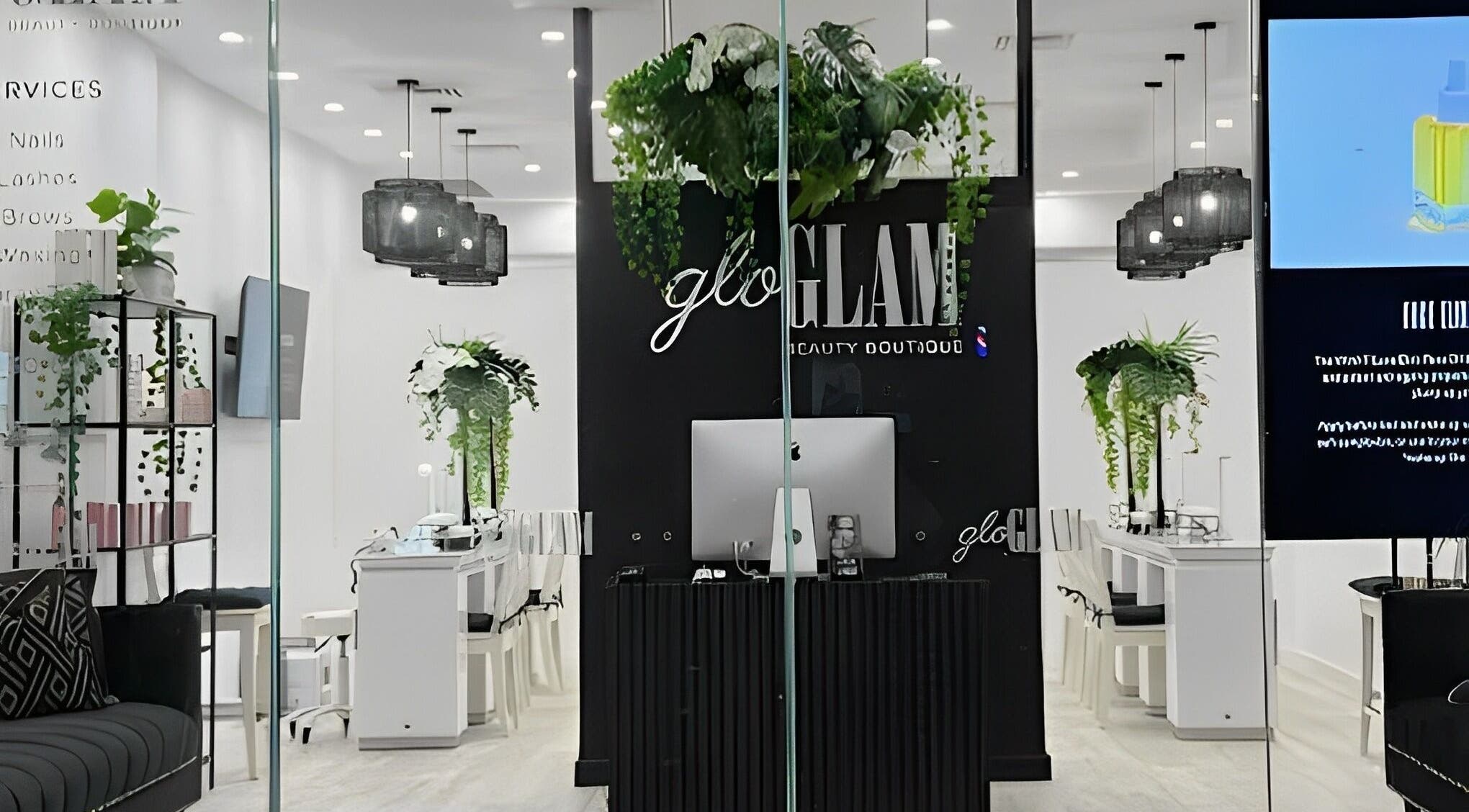 Modern interior of Gloglam, Main Beach, Queensland, AU, featuring sleek design with greenery and elegant lighting.