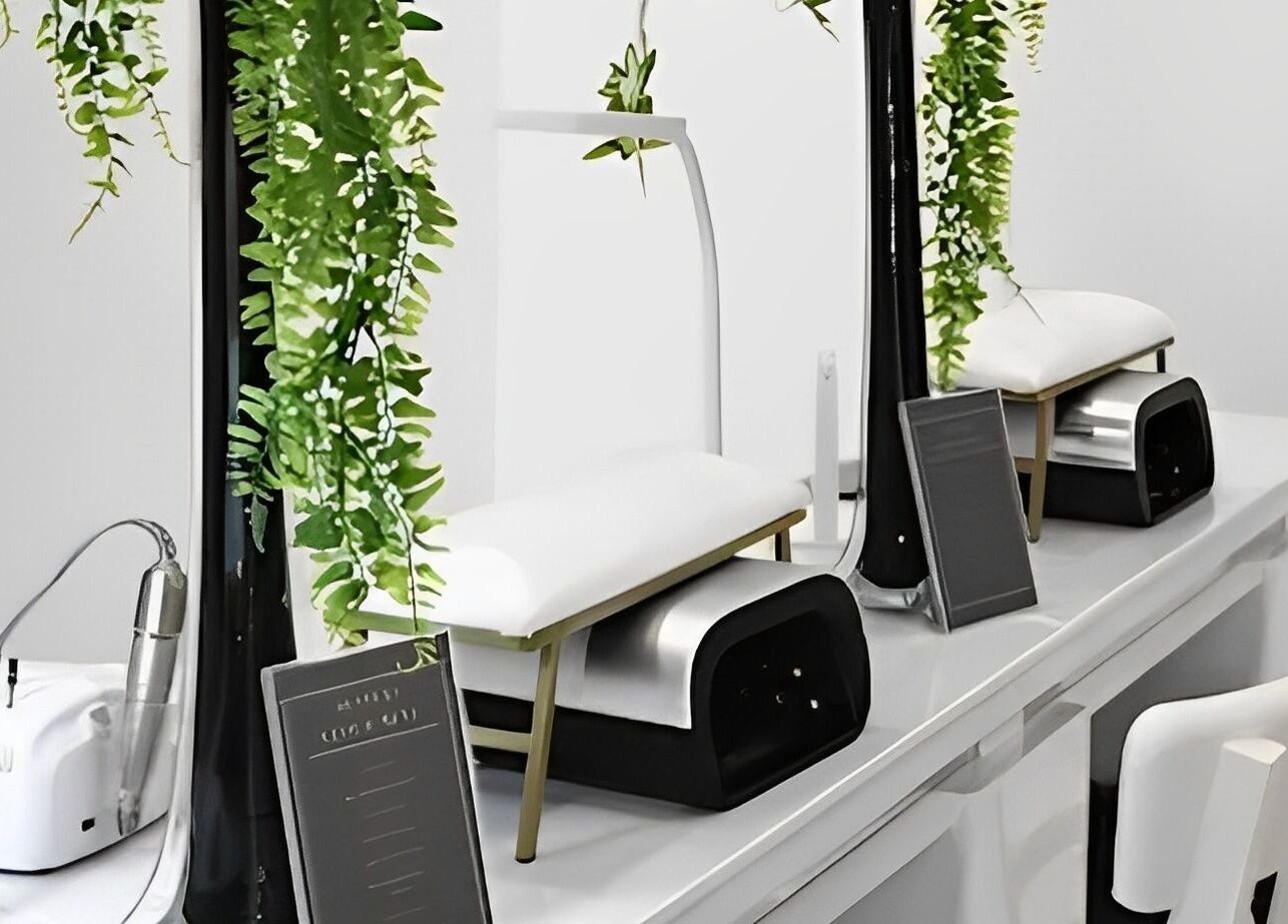 Elegant nail station at Gloglam, Main Beach, Queensland, AU, adorned with lush green plants.