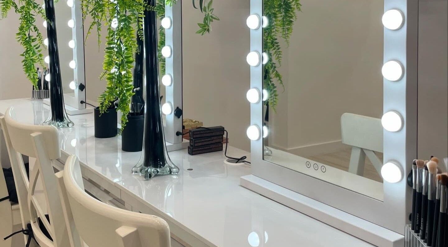 Elegant vanity mirrors with lights and greenery at Gloglam, Main Beach, Queensland, AU.