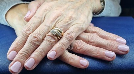 Elegant nails with rings at The Beauty Pond, Swindon, England, GB.