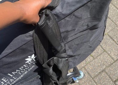 Close-up of a hand holding a portable spa kit from Original Goddess Earth Energy — Mobile Services, London, England, GB.