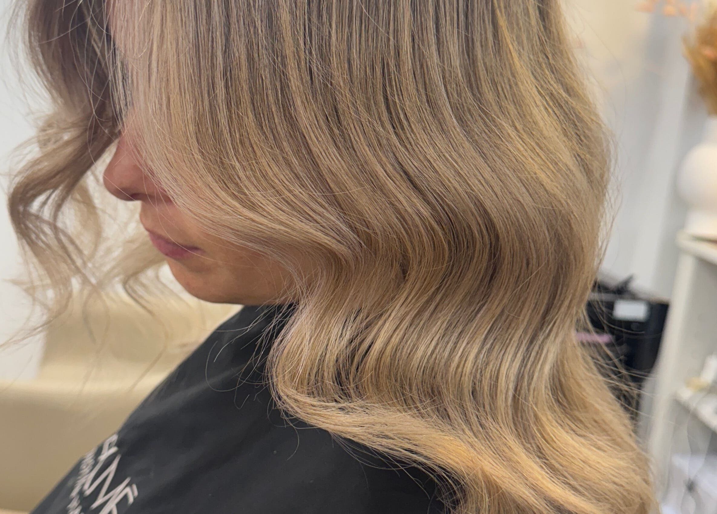 Elegant blonde waves styled at StudioBlonde By Tahlia in Mona Vale, New South Wales, AU.
