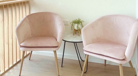 Elegant pink chairs at K-Beauty Sensation Studio, Frewville, South Australia, AU, offering a relaxing ambiance.