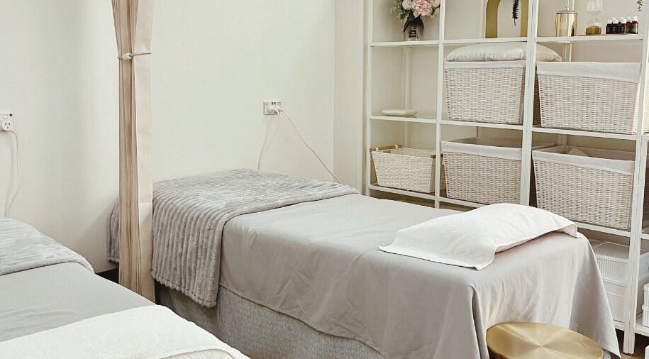 K-Beauty Sensation Studio's tranquil treatment room in Frewville, South Australia, AU with cozy beds and elegant decor.
