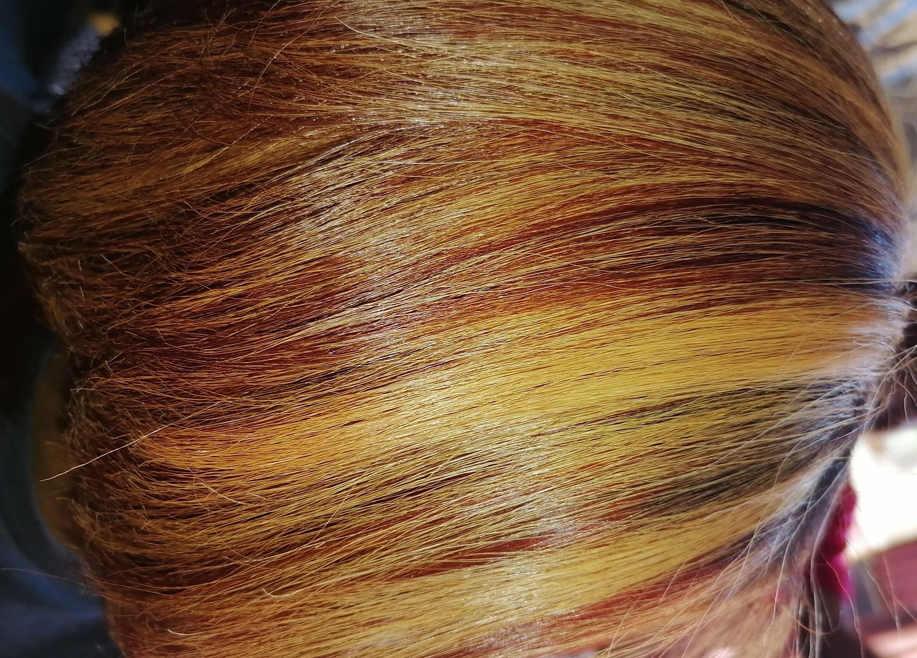 Vibrant hair color at Sassy hairstudio, Saldanha, Western Cape, ZA showcasing dynamic highlights.