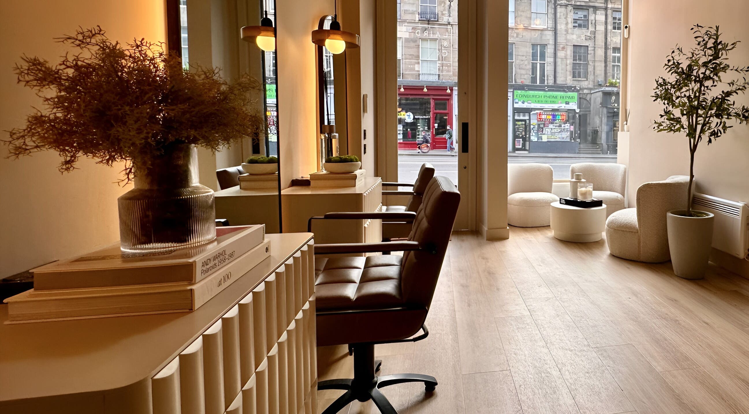 Modern interior of Laird & Co by Christopher Laird, Edinburgh, Scotland, GB with stylish chairs and lighting.