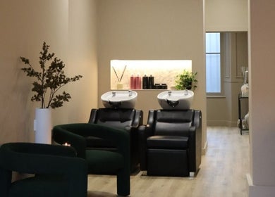 Modern salon washing stations at Laird & Co by Christopher Laird, Edinburgh, Scotland, GB offer a chic ambiance.