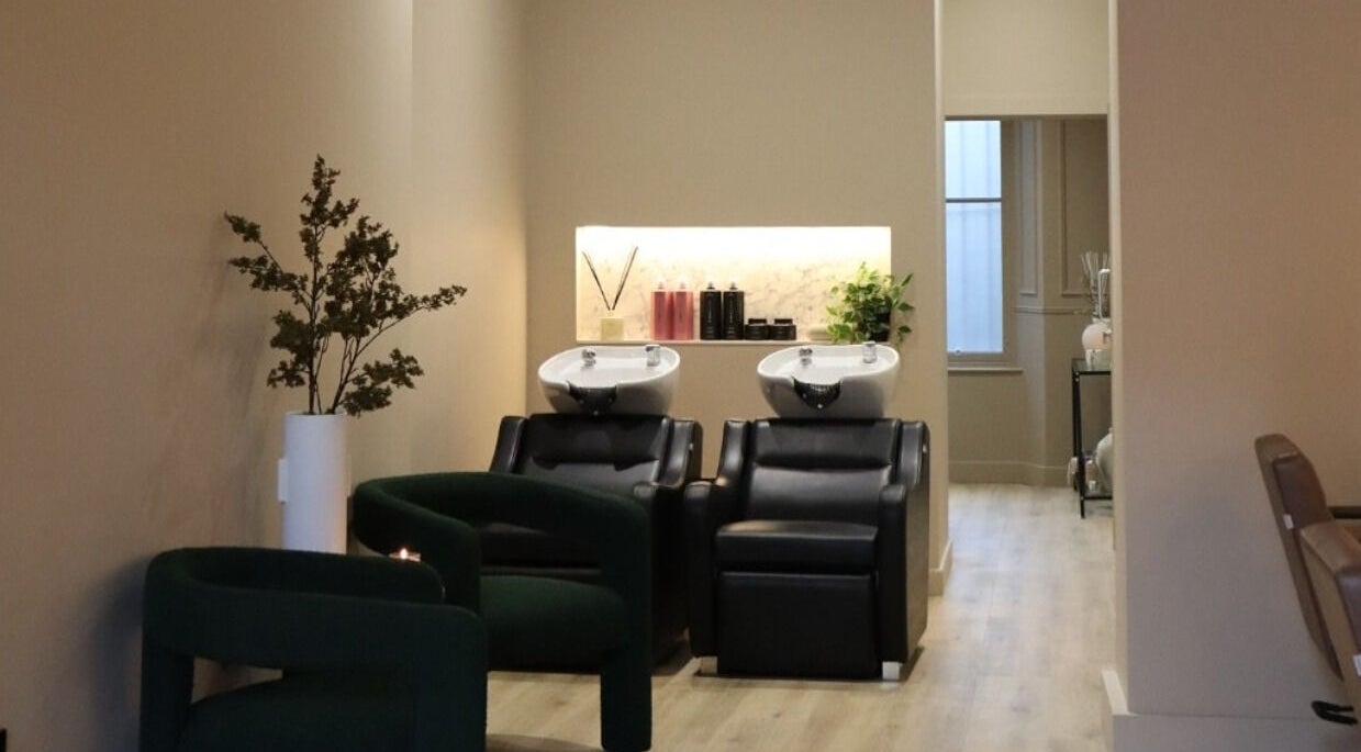 Modern salon washing stations at Laird & Co by Christopher Laird, Edinburgh, Scotland, GB offer a chic ambiance.