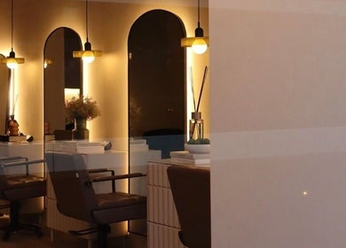 Stylish interior of Laird & Co by Christopher Laird in Edinburgh, Scotland, GB, featuring chic mirrors and seating.