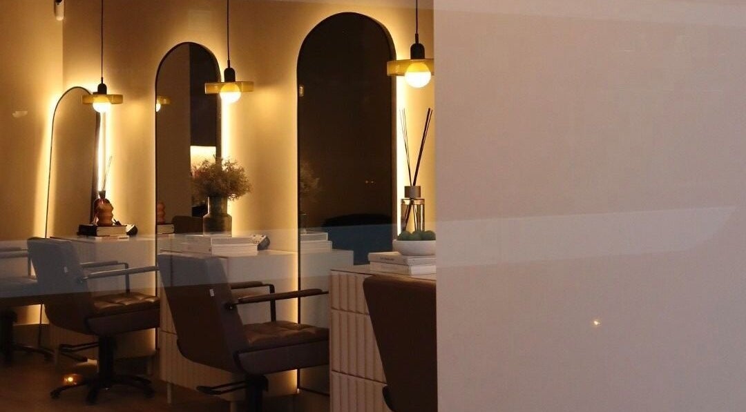 Stylish interior of Laird & Co by Christopher Laird in Edinburgh, Scotland, GB, featuring chic mirrors and seating.