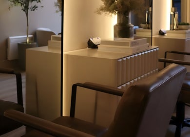 Stylish salon interior at Laird & Co by Christopher Laird in Edinburgh, Scotland, GB with elegant seating and decor.