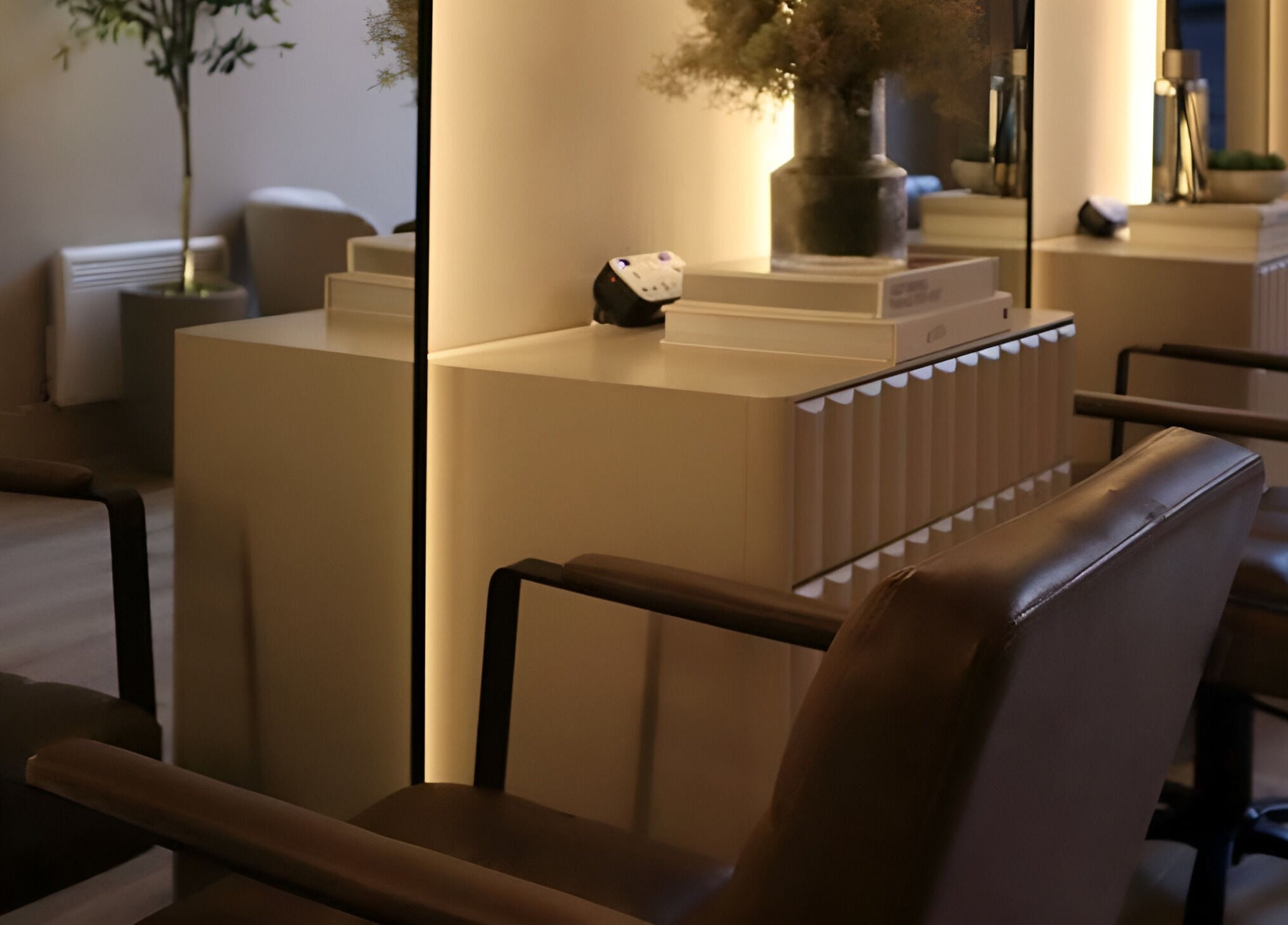 Stylish salon interior at Laird & Co by Christopher Laird in Edinburgh, Scotland, GB with elegant seating and decor.