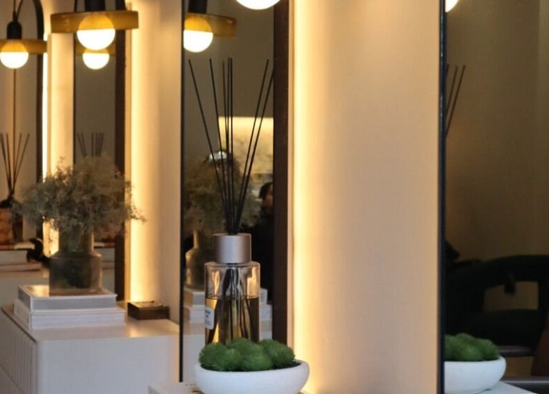 Stylish interior of Laird & Co by Christopher Laird, Edinburgh, Scotland with warm lighting and decor.