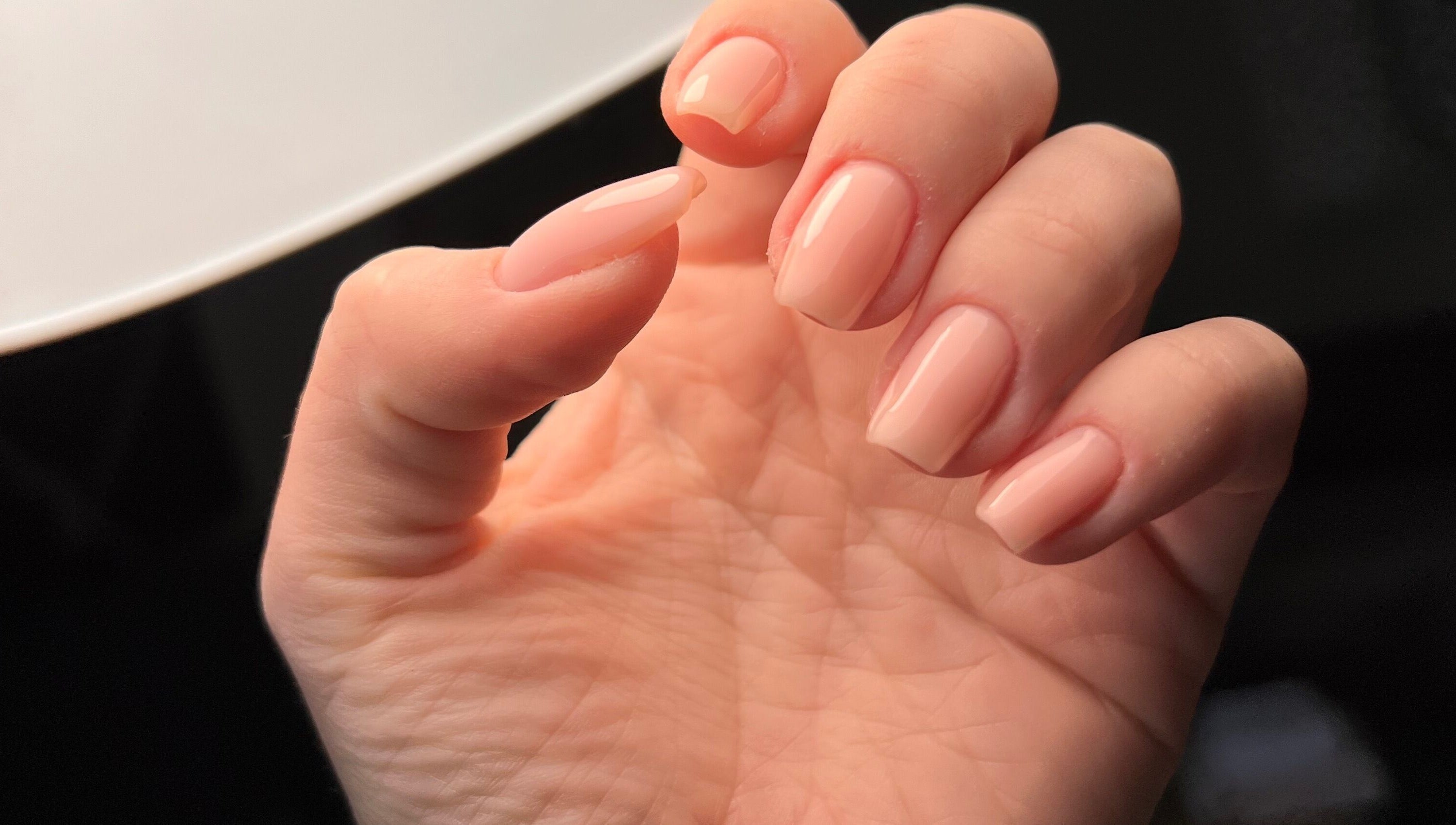 Elegant nude manicure at Nails by Olivia, Calvià, Illes Balears, ES showcasing flawless finish.